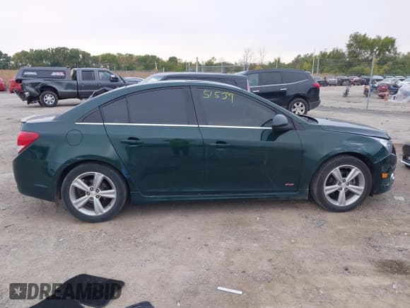 ✅ 2014 Chevrolet Cruze 2LT • VIN: 1G1PE5SB1E7188370 • Lot: 43251539. Listed on IAAI with 135,278 mi. Free auction sales archive from the USA and detailed vehicle history report at DreamBid. Image 13.