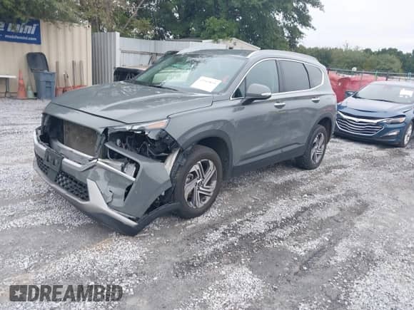 2023 Hyundai Santa Fe SEL with VIN 5NMS2DAJ3PH627917, listed as a IAAI auction lot 43565855 with 57,979 mi miles and . Bid and sale history available at DreamBid. Image 2.