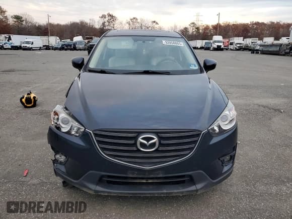 ✅ 2016 Mazda CX-5 Grand Touring • VIN: JM3KE4DY7G0859184 • Lot: 92858065. Wystawiony na Copart z przebiegiem 45 518 mil. Bezpłatny archiwum sprzedaży aukcyjnych z USA i szczegółowy raport historii pojazdu na DreamBid. Zdjęcie 5.