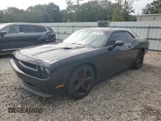 2013 Dodge Challenger SXT with VIN 2C3CDYAG7DH613511, listed as a Copart auction lot 81931495 with 198,583 mi miles and Clean title. Bid and sale history available at DreamBid. Image 1.