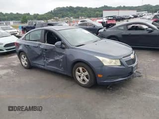 ✅ 2013 Chevrolet Cruze 1LT • VIN: 1G1PC5SB2D7284853 • Lot: 43273117. Listed on IAAI with 124,640 mi. Free auction sales archive from the USA and detailed vehicle history report at DreamBid. Image 1.