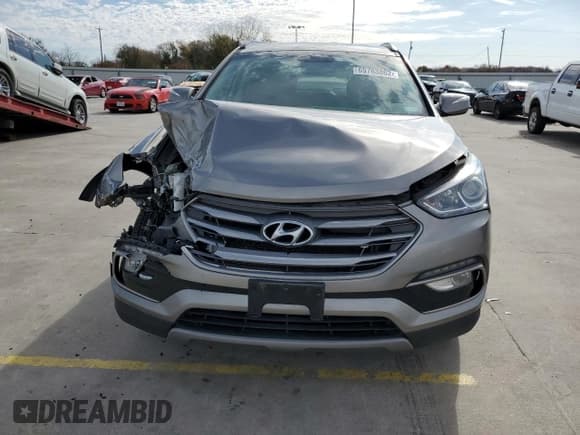 ✅ 2018 Hyundai Santa Fe 2.4L • VIN: 5NMZU3LB4JH060651 • Лот: 69763862. Опубликован ранее на Copart с пробегом 73 770 миль. Бесплатный доступ к архиву аукционных продаж из США и подробный отчёт об истории автомобиля на DreamBid. Изображение 5.