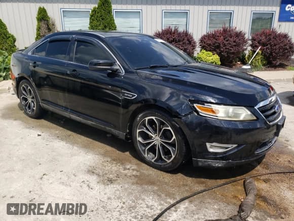 ✅ 2012 Ford Taurus SHO • VIN: 1FAHP2KT5CG100467 • Лот: 64783925. Опубликован ранее на Copart с пробегом 165 515 миль. Бесплатный доступ к архиву аукционных продаж из США и подробный отчёт об истории автомобиля на DreamBid. Изображение 4.