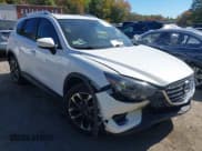 ✅ 2016 Mazda CX-5 Grand Touring • VIN: JM3KE4DY8G0908425 • Lot: 43350691. Wystawiony na IAAI z przebiegiem 144 684 mil. Bezpłatny archiwum sprzedaży aukcyjnych z USA i szczegółowy raport historii pojazdu na DreamBid. Zdjęcie 1.