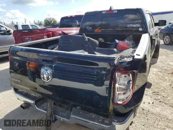 2023 Ram 1500 Lone Star with VIN 1C6RREMT8PN565793, listed as a Copart auction lot 77084184 with 18,825 mi miles and Salvage title. Bid and sale history available at DreamBid. Image 6.
