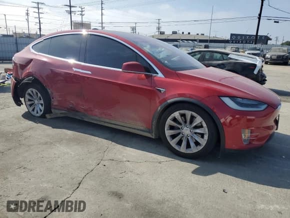 ✅ 2017 Tesla Model X 90D • VIN: 5YJXCDE21HF068943 • Lot: 85755345. Listed on Copart with 93,363 mi. Free auction sales archive from the USA and detailed vehicle history report at DreamBid. Image 4.