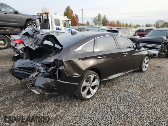 ✅ 2018 Honda Accord Touring • VIN: 1HGCV1F99JA134223 • Лот: 90546455. Опубликован ранее на Copart с пробегом 75 482 миль. Бесплатный доступ к архиву аукционных продаж из США и подробный отчёт об истории автомобиля на DreamBid. Изображение 3.