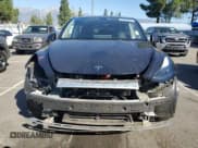 ✅ 2024 Tesla Model Y • VIN: 7SAYGDED3RF118899 • Lot: 87443625. Wystawiony na Copart z przebiegiem 28 225 mil. Bezpłatny archiwum sprzedaży aukcyjnych z USA i szczegółowy raport historii pojazdu na DreamBid. Zdjęcie 5.