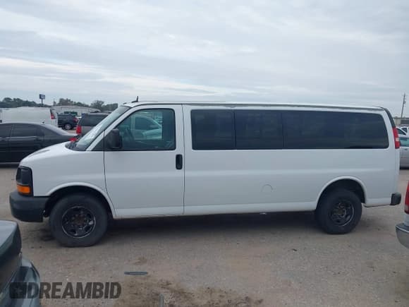 ✅ 2014 Chevrolet Express Passenger LS • VIN: 1GAZGZFGXE1112875 • Lot: 43821369. Listed on IAAI with 162,209 mi. Free auction sales archive from the USA and detailed vehicle history report at DreamBid. Image 14.