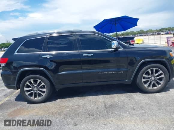 2018 Jeep Grand Cherokee Limited z VIN 1C4RJEBG7JC353475, wystawiony jako IAAI lot #43057910 z przebiegiem 87 674 mil mil oraz . Historia ofert i sprzedaży dostępna na DreamBid. Obrazek 13.