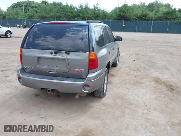 ✅ 2006 GMC Envoy SLE • VIN: 1GKDT13S462146169 • Lot: 42686071. Listed on IAAI with 255,000 mi. Free auction sales archive from the USA and detailed vehicle history report at DreamBid. Image 4.