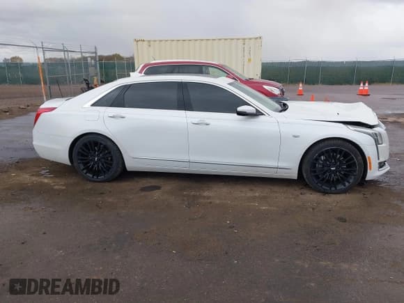 ✅ 2016 Cadillac CT6 Platinum AWD • VIN: 1G6KK5R62GU165223 • Lot: 43601642. Listed on IAAI with 135,869 mi. Free auction sales archive from the USA and detailed vehicle history report at DreamBid. Image 13.