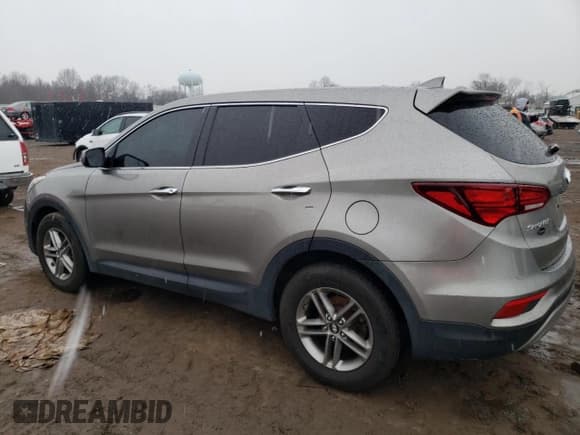 ✅ 2017 Hyundai Santa Fe 2.4L • VIN: 5XYZTDLB8HG413888 • Лот: 38315323. Опубликован ранее на Copart с пробегом 119 683 миль. Бесплатный доступ к архиву аукционных продаж из США и подробный отчёт об истории автомобиля на DreamBid. Изображение 2.