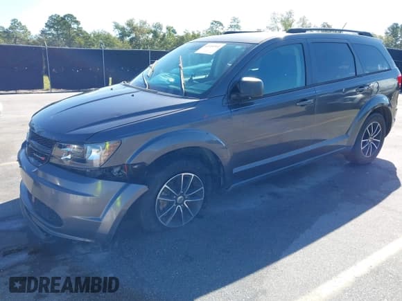 ✅ 2018 Dodge Journey SE • VIN: 3C4PDCAB7JT158375 • Лот: 43354911. Опубликован ранее на IAAI с пробегом 95 554 миль. Бесплатный доступ к архиву аукционных продаж из США и подробный отчёт об истории автомобиля на DreamBid. Изображение 2.