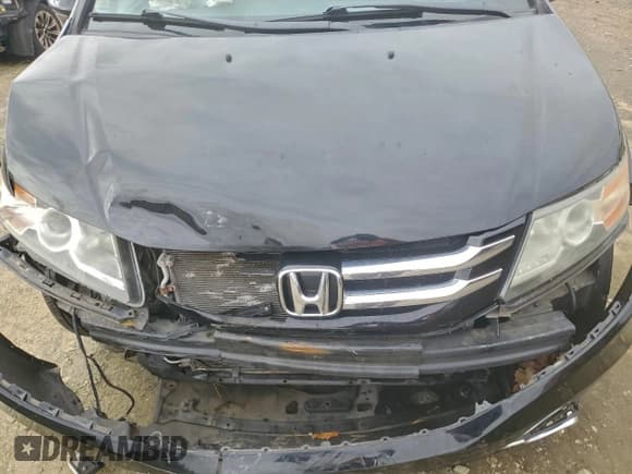 ✅ 2014 Honda Odyssey Touring • VIN: 5FNRL5H90EB094582 • Lot: 93588585. Listed on Copart with 148,694 mi. Free auction sales archive from the USA and detailed vehicle history report at DreamBid. Image 12.