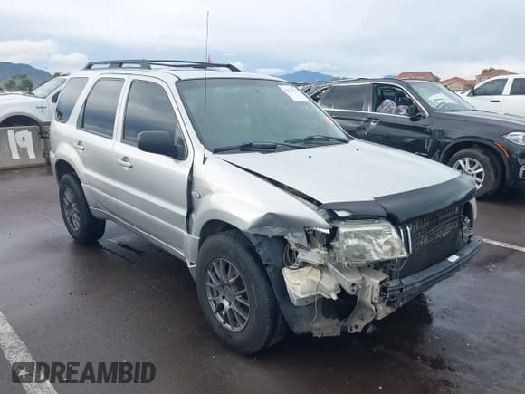 ✅ 2005 Mercury Mariner Luxury • VIN: 4M2CU57135DJ13772 • Лот: 43727947. Опубликован ранее на IAAI с пробегом 191 217 миль. Бесплатный доступ к архиву аукционных продаж из США и подробный отчёт об истории автомобиля на DreamBid. Изображение 1.
