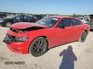 2019 Dodge Charger SXT with VIN 2C3CDXBG0KH713679, listed as a Copart auction lot 86592675 with 75,201 mi miles and Salvage title. Bid and sale history available at DreamBid. Image 1.