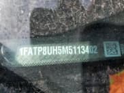 ✅ 2021 Ford Mustang EcoBoost • VIN: 1FATP8UH5M5113402 • Lot: 70662195. Listed on Copart with 105,301 mi. Free auction sales archive from the USA and detailed vehicle history report at DreamBid. Image 12.