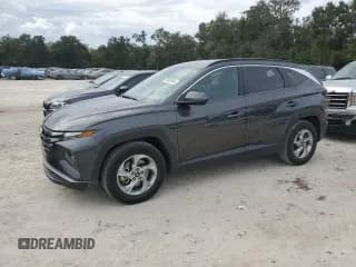 ✅ 2022 Hyundai Tucson SEL • VIN: 5NMJB3AE5NH045825 • Lot: 79861644. Wystawiony na Copart z przebiegiem 56 956 mil. Bezpłatny archiwum sprzedaży aukcyjnych z USA i szczegółowy raport historii pojazdu na DreamBid. Zdjęcie 1.