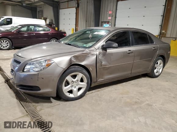 ✅ 2010 Chevrolet Malibu 1LS • VIN: 1G1ZB5EB4AF203697 • Lot: 73420834. Listed on Copart with 103,662 mi. Free auction sales archive from the USA and detailed vehicle history report at DreamBid. Image 1.