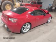 ✅ 2013 Subaru BRZ Premium • VIN: JF1ZCAB10D1612800 • Lot: 40942931. Listed on IAAI with 75,411 mi. Free auction sales archive from the USA and detailed vehicle history report at DreamBid. Image 4.