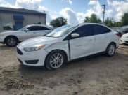 ✅ 2015 Ford Focus SE • VIN: 1FADP3F20FL342858 • Lot: 56569365. Listed on Copart with 94,211 mi. Free auction sales archive from the USA and detailed vehicle history report at DreamBid. Image 1.