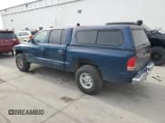 ✅ 2002 Dodge Dakota SLT • VIN: 1B7HG48N32S720700 • Lot: 80234494. Wystawiony na Copart z przebiegiem 207 035 mil. Bezpłatny archiwum sprzedaży aukcyjnych z USA i szczegółowy raport historii pojazdu na DreamBid. Zdjęcie 2.