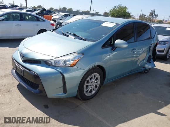 ✅ 2015 Toyota Prius Two • VIN: JTDZN3EU9FJ032759 • Lot: 42620922. Listed on IAAI with 151,572 mi. Free auction sales archive from the USA and detailed vehicle history report at DreamBid. Image 2.