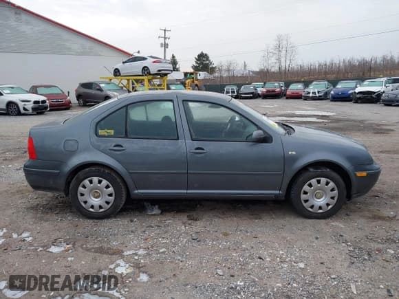 ✅ 2003 Volkswagen Jetta GL • VIN: 3VWRK69M03M159898 • Lot: 41474530. Listed on IAAI with 237,485 mi. Free auction sales archive from the USA and detailed vehicle history report at DreamBid. Image 13.