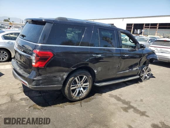 ✅ 2022 Ford Expedition Limited • VIN: 1FMJU2AT0NEA41232 • Lot: 62710905. Listed on Copart with 76,877 mi. Free auction sales archive from the USA and detailed vehicle history report at DreamBid. Image 3.