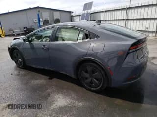 ✅ 2023 Toyota Prius LE • VIN: JTDACAAU1P3004571 • Lot: 57877853. Listed on Copart with 8,760 mi. Free auction sales archive from the USA and detailed vehicle history report at DreamBid. Image 2.