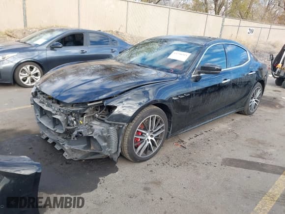 ✅ 2017 Maserati Ghibli S • VIN: ZAM57RSA1H1230224 • Lot: 43756511. Listed on IAAI with 96,802 mi. Free auction sales archive from the USA and detailed vehicle history report at DreamBid. Image 2.