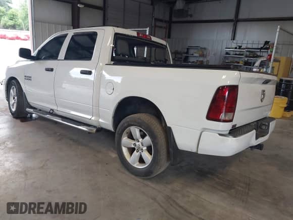 2014 Ram 1500 Tradesman z VIN 1C6RR6KG3ES480709, wystawiony jako IAAI lot #42817489 z przebiegiem 170 425 mil mil oraz . Historia ofert i sprzedaży dostępna na DreamBid. Obrazek 3.