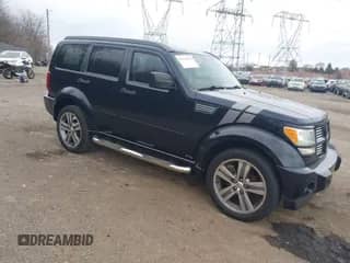 2011 Dodge Nitro Shock z VIN 1D4PT7GX6BW556494, wystawiony jako IAAI lot #41739594 z przebiegiem 134 346 mil mil oraz . Historia ofert i sprzedaży dostępna na DreamBid. Obrazek 1.