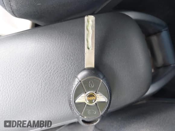 ✅ 2006 MINI Hardtop • VIN: WMWRC33546TJ75234 • Lot: 43091430. Listed on IAAI with 52,367 mi. Free auction sales archive from the USA and detailed vehicle history report at DreamBid. Image 11.