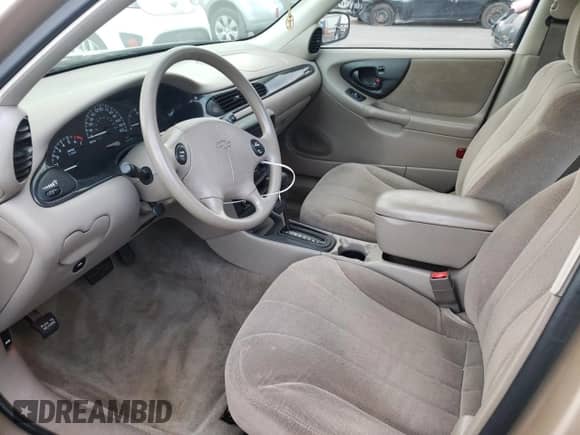 2001 Chevrolet Malibu z VIN 1G1ND52J11M611817, wystawiony jako Copart lot #81978184 z przebiegiem 81 150 mil mil oraz Szkoda całkowita • Salvage title. Historia ofert i sprzedaży dostępna na DreamBid. Obrazek 7.