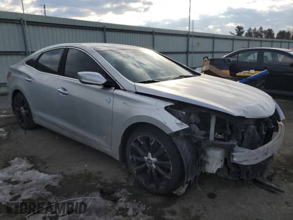 2013 Hyundai Azera z VIN KMHFH4JG5DA300781, wystawiony jako Copart lot #42493805 z przebiegiem 165 673 mil mil oraz Szkoda całkowita • Salvage title. Historia ofert i sprzedaży dostępna na DreamBid. Obrazek 4.