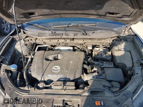 ✅ 2015 Mazda CX-5 Grand Touring • VIN: JM3KE4DY3F0509243 • Lot: 43252834. Listed on IAAI with 139,870 mi. Free auction sales archive from the USA and detailed vehicle history report at DreamBid. Image 10.