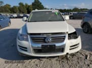 ✅ 2009 Volkswagen Touareg V6 • VIN: WVGFM77L59D035884 • Lot: 71473874. Wystawiony na Copart z przebiegiem 192 921 mil. Bezpłatny archiwum sprzedaży aukcyjnych z USA i szczegółowy raport historii pojazdu na DreamBid. Zdjęcie 5.