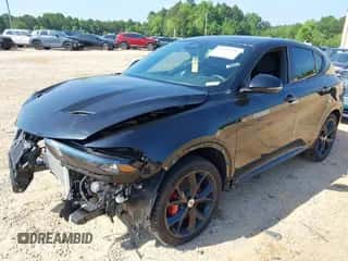 2024 Dodge Hornet R/T Plus z VIN ZACPDFDWXR3A07864, wystawiony jako IAAI lot #42595338 z przebiegiem 4 205 mil mil oraz . Historia ofert i sprzedaży dostępna na DreamBid. Obrazek 2.