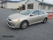 ✅ 2014 Toyota Camry XLE • VIN: 4T1BD1FK7EU126590 • Лот: 91586915. Опубликован ранее на Copart с пробегом 301 515 миль. Бесплатный доступ к архиву аукционных продаж из США и подробный отчёт об истории автомобиля на DreamBid. Изображение 1.