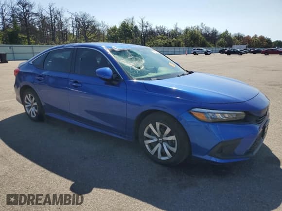 ✅ 2023 Honda Civic LX • VIN: 2HGFE2F25PH534005 • Lot: 71880095. Listed on Copart with 18,365 mi. Free auction sales archive from the USA and detailed vehicle history report at DreamBid. Image 4.