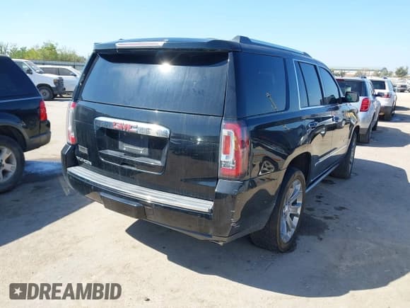 ✅ 2015 GMC Yukon Denali • VIN: 1GKS2CKJ3FR163213 • Lot: 43404430. Listed on IAAI with 205,146 mi. Free auction sales archive from the USA and detailed vehicle history report at DreamBid. Image 4.