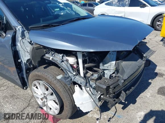 ✅ 2024 Toyota Corolla Cross LE • VIN: 7MUBAAAG5RV074005 • Lot: 43650690. Listed on IAAI with 28,494 mi. Free auction sales archive from the USA and detailed vehicle history report at DreamBid. Image 6.