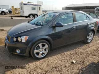 2015 Chevrolet Sonic LTZ with VIN 1G1JE5SB1F4103066, listed as a Copart auction lot 68816515 with 58,819 mi miles and Salvage title. Bid and sale history available at DreamBid. Image 1.