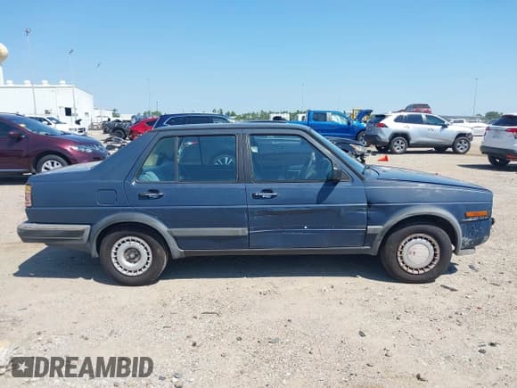 ✅ 1989 Volkswagen Jetta • VIN: WVWRB11GXKW378006 • Lot: 43152661. Wystawiony na IAAI z przebiegiem 66 430 mil. Bezpłatny archiwum sprzedaży aukcyjnych z USA i szczegółowy raport historii pojazdu na DreamBid. Zdjęcie 14.