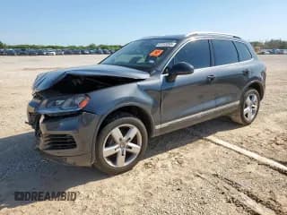 ✅ 2013 Volkswagen Touareg Lux • VIN: WVGEF9BPXDD007888 • Lot: 61243265. Listed on Copart with 90,370 mi. Free auction sales archive from the USA and detailed vehicle history report at DreamBid. Image 1.