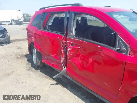 2013 Dodge Journey American Value with VIN 3C4PDCAB7DT500881, listed as a IAAI auction lot 43193439 with 165,029 mi miles and . Bid and sale history available at DreamBid. Image 6.