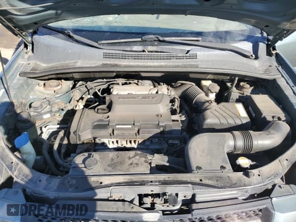 ✅ 2009 Kia Sportage LX • VIN: KNDJF724X97571379 • Lot: 90826215. Wystawiony na Copart z przebiegiem 143 239 mil. Bezpłatny archiwum sprzedaży aukcyjnych z USA i szczegółowy raport historii pojazdu na DreamBid. Zdjęcie 12.