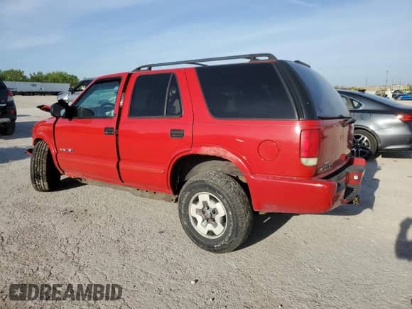 2002 Chevrolet Blazer LS z VIN 1GNDT13W12K191392, wystawiony jako Copart lot #51730254 z przebiegiem Nie podano mil oraz Szkoda całkowita • Salvage title. Historia ofert i sprzedaży dostępna na DreamBid. Obrazek 2.